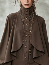 Chocolate high-neck mini dress with cape-style paneling
