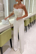 Margovil Off Shoulder Feather Splice Belted Jumpsuit